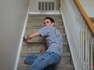 The electric sander was broken, so Tommy had to work a little harder to smooth my stairwell.